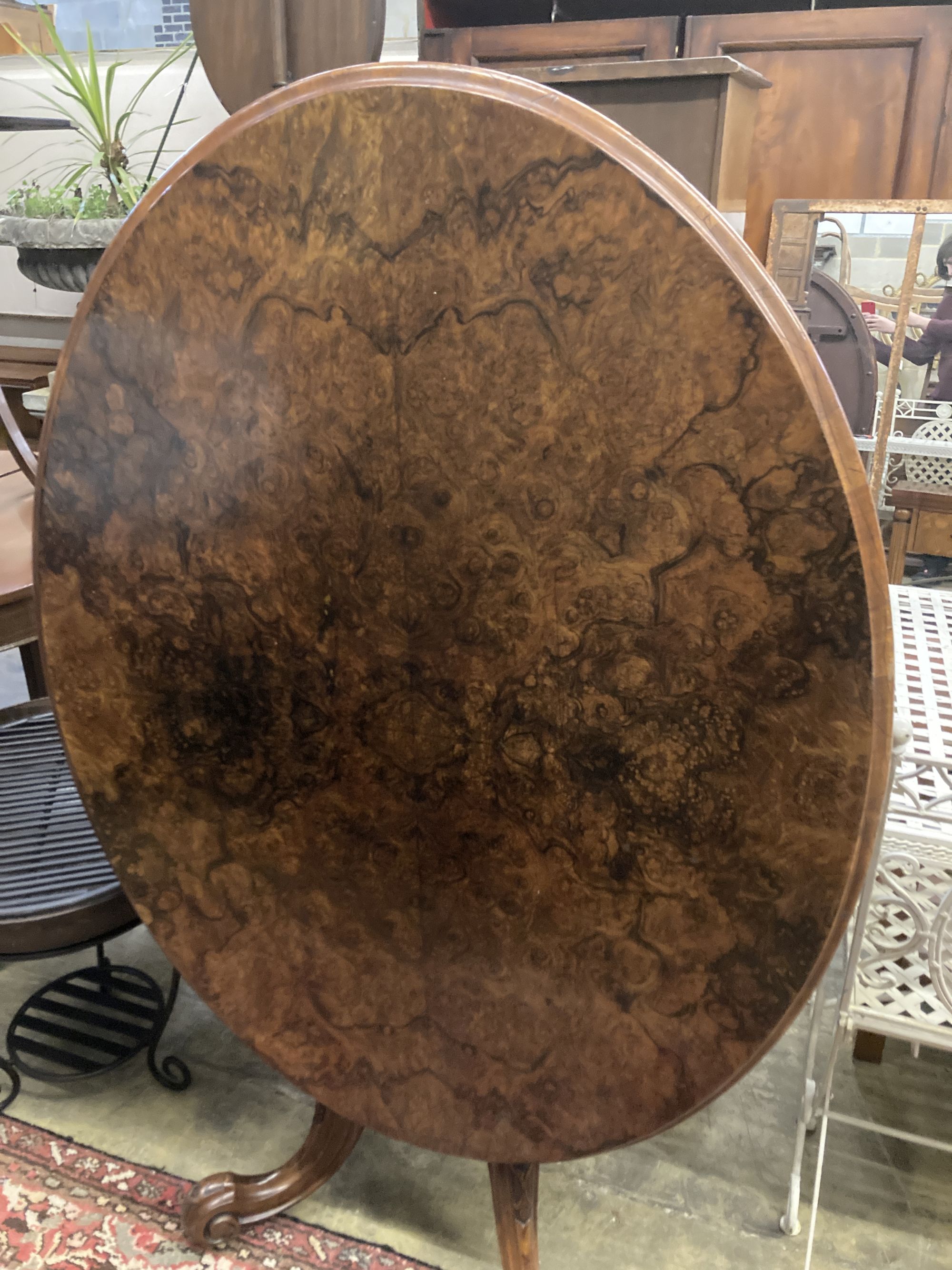 A Victorian burr walnut oval loo table, length 120cm, height 72cm